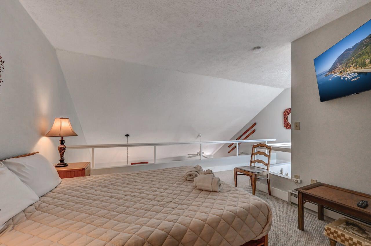 116 Snow Ridge Cir Lake Lake Harmony, PA 18624 - Photo 42 of 48 a bedroom with a bed and a flat screen tv