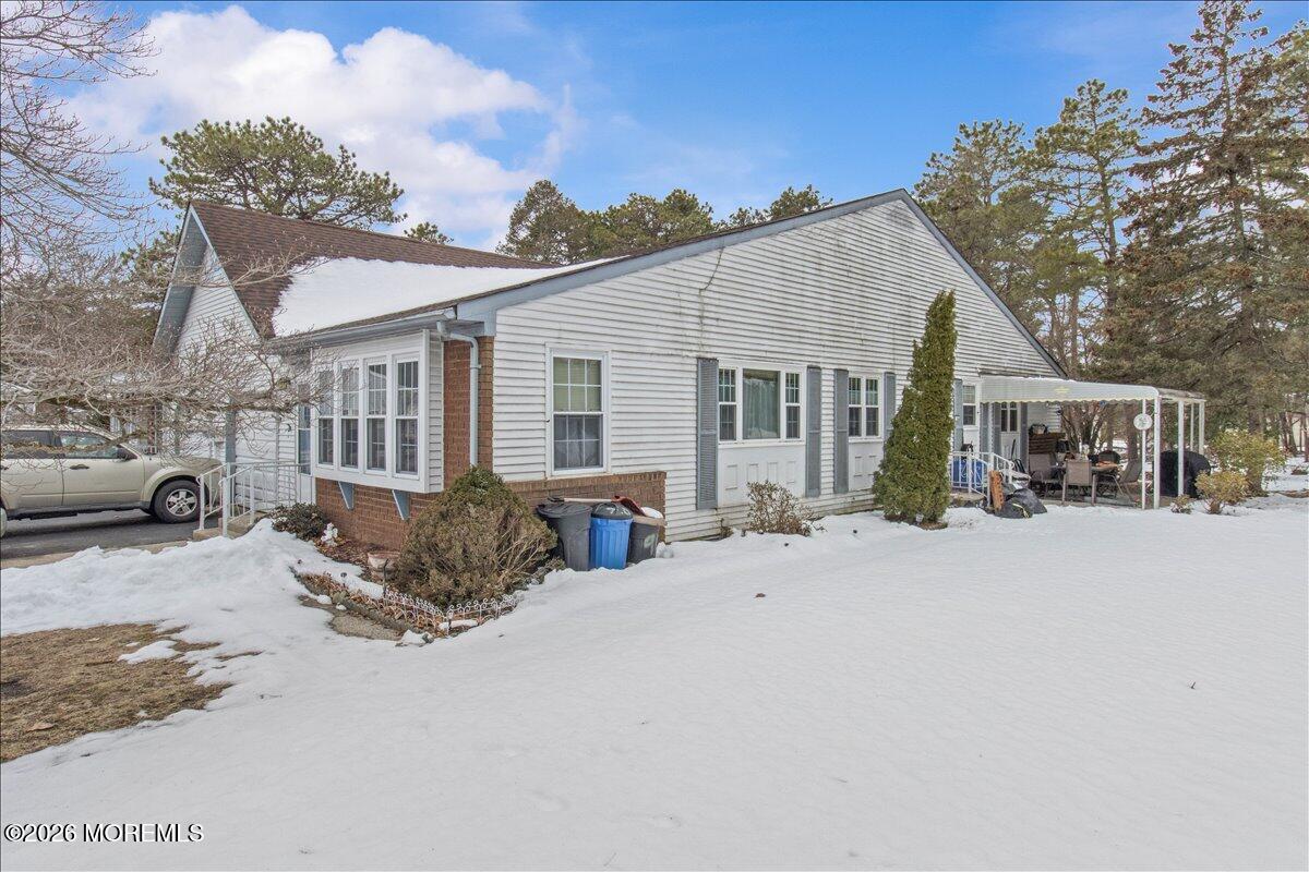 4 B Cottage Court Whiting, NJ 08759 - Photo 2 of 3 a view of a house with a patio