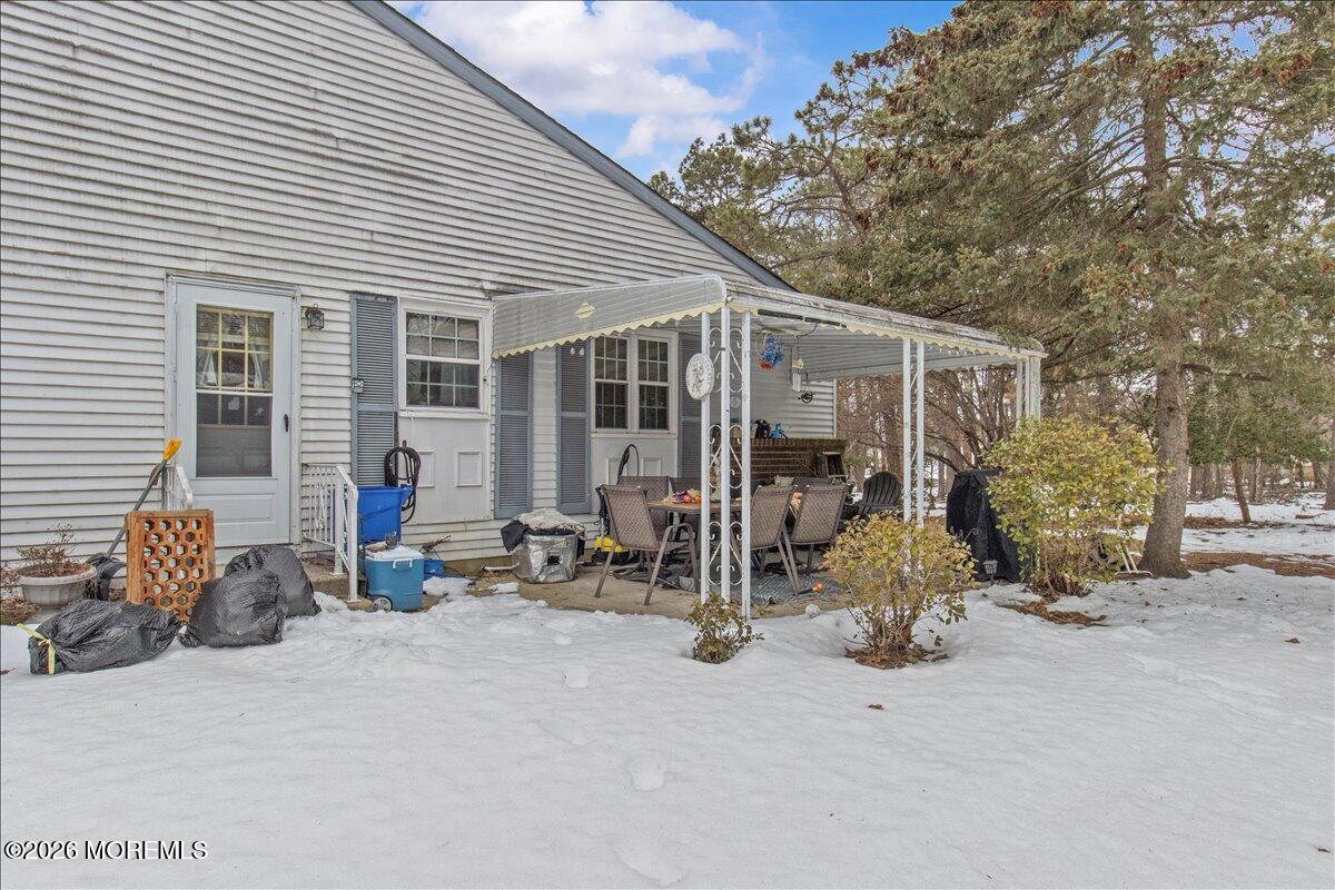 4 B Cottage Court Whiting, NJ 08759 - Photo 3 of 3 a view of a chair and tables in patio
