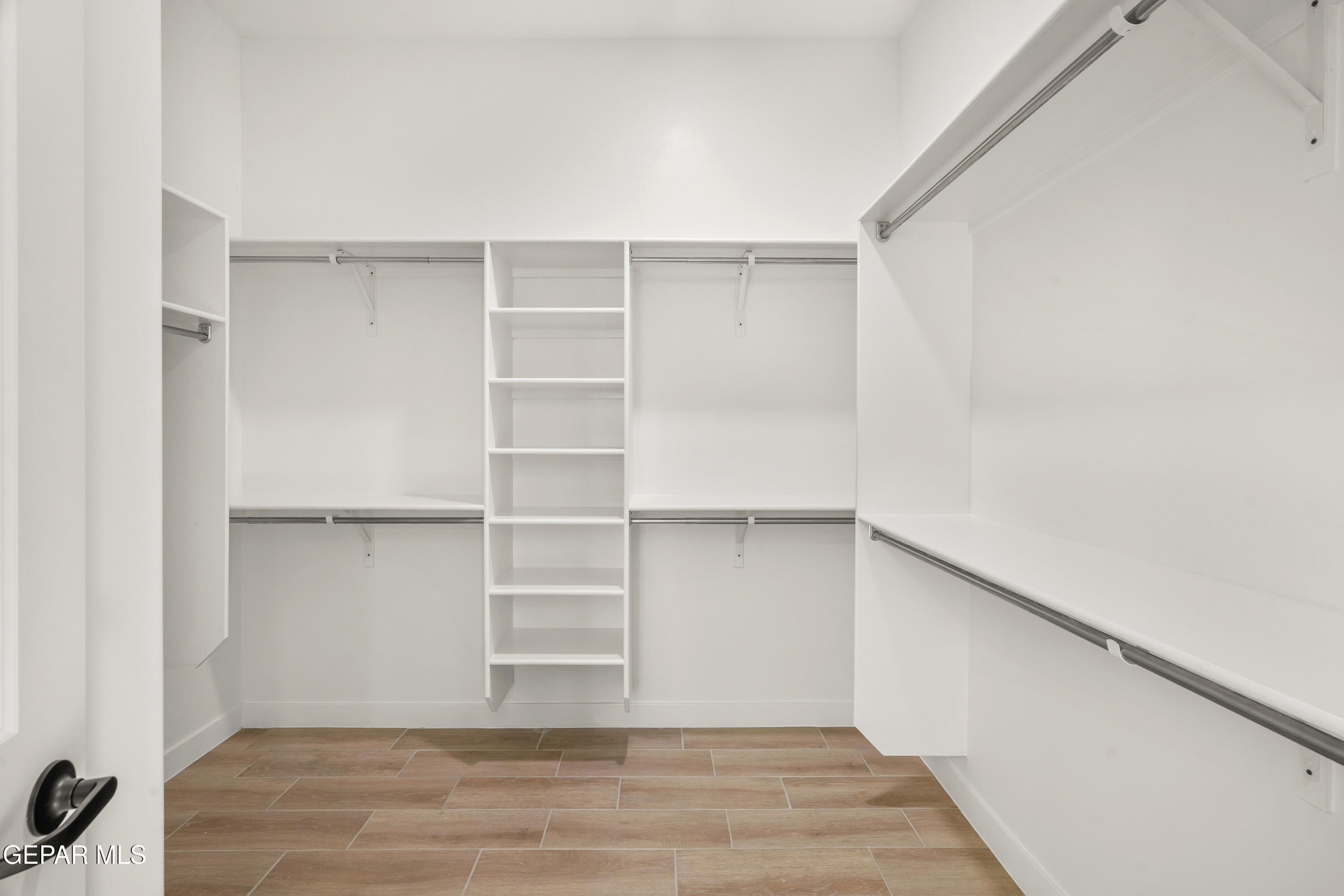 15224 Resolve El Paso, TX 79938 - Photo 38 of 38 a view of walk in closet with empty racks