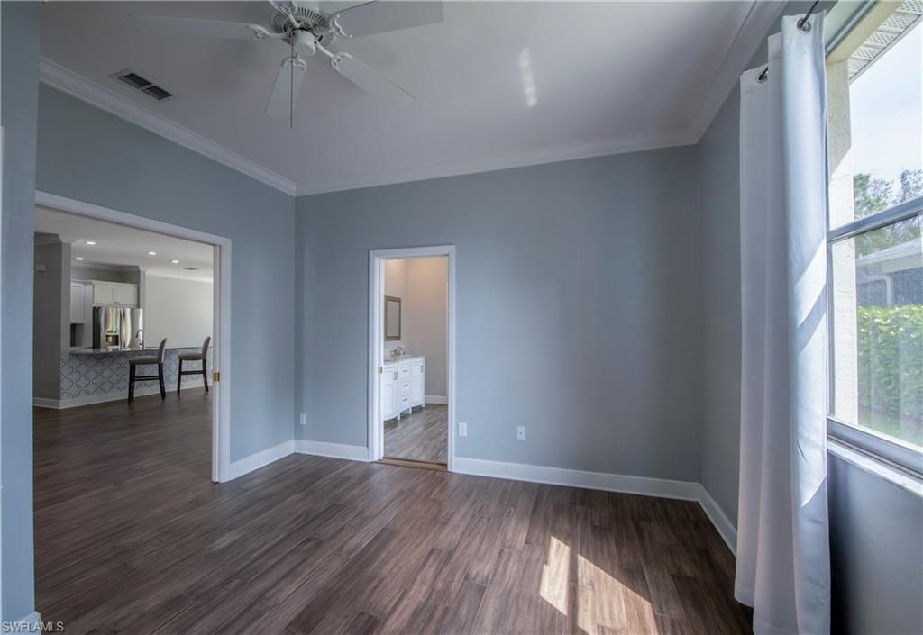 9229 Lanthorn Way Estero, FL 33928 - Photo 24 of 41 a view of livingroom with hardwood floor and window
