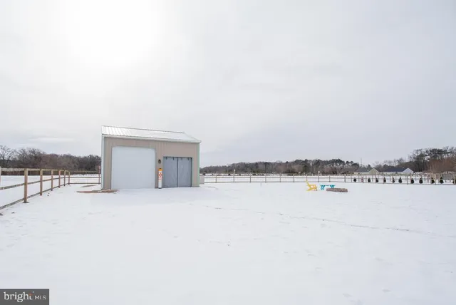 a view of a swimming pool with a lounge chair