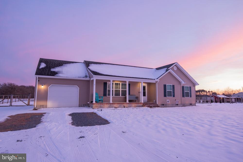 17180 Philips Hill Road Laurel, DE 19956 - Photo 61 of 65 a front view of a house with a yard and large trees