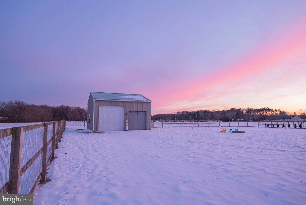 17180 Philips Hill Road Laurel, DE 19956 - Photo 64 of 65 a view of a dry yard with a house in the background
