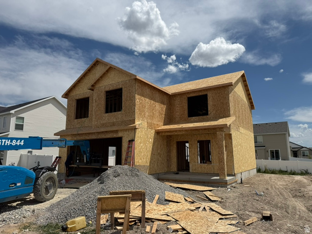250 West 550 North Smithfield, UT 84335 - Photo 3 of 8 Two-story residence under construction with a multi-gabled roofline and an integrated garage space