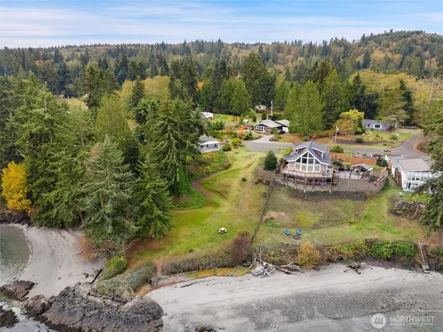 a view of a lake with a yard