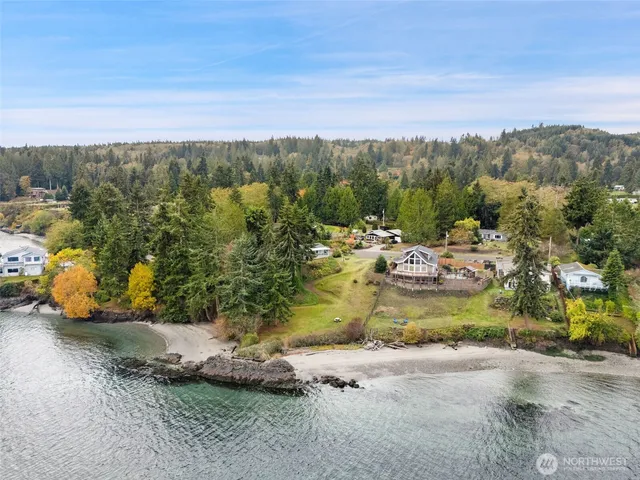a view of swimming pool with a yard and seating area