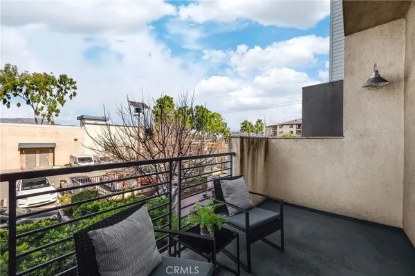 a view of a terrace with city view