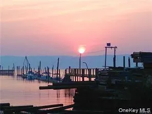a view of a lake with a large bridge