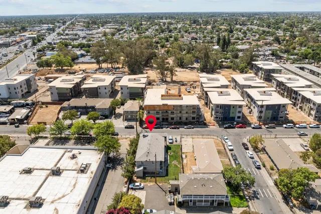 an aerial view of a city with lots of residential buildings