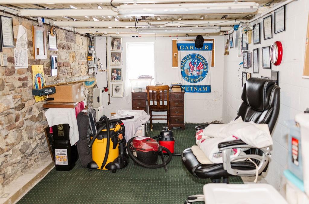 1898 Schellsburg Road Claysburg, PA 16625 - Photo 37 of 50 previously used as an office. Note the meticulously maintained original stonework. Home is original stone under siding.
