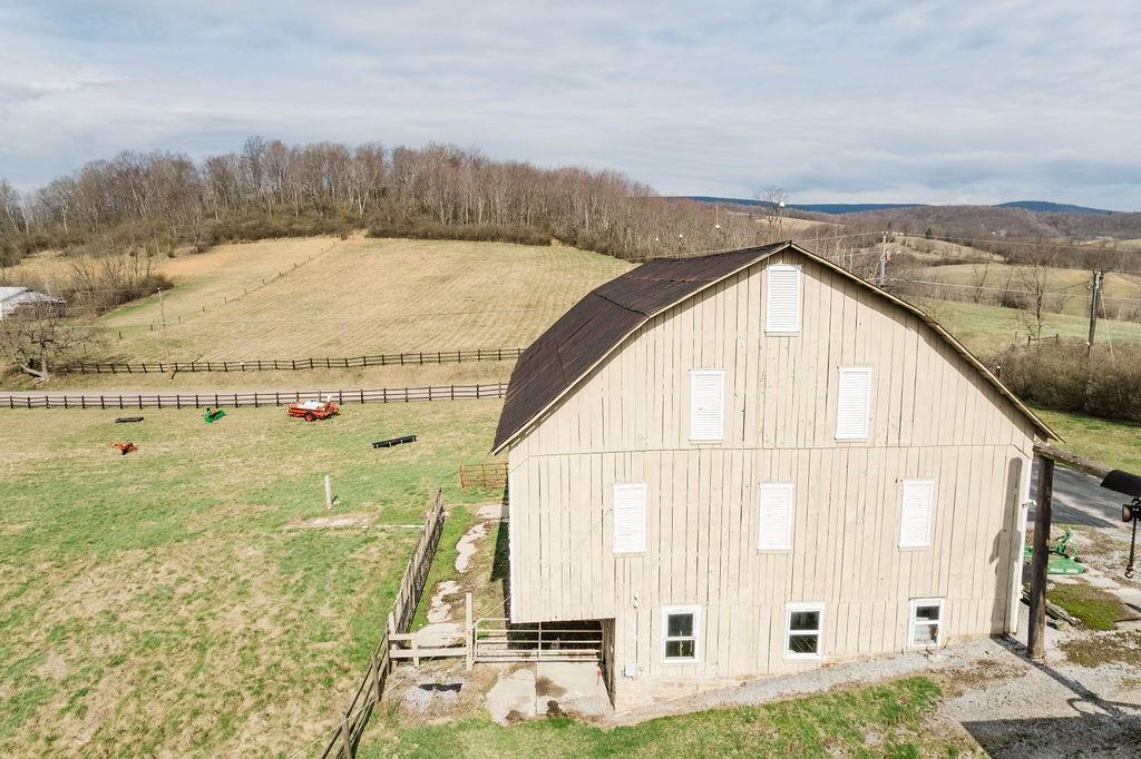 1898 Schellsburg Road Claysburg, PA 16625 - Photo 7 of 50 Barn, fields and high tension electric fencing