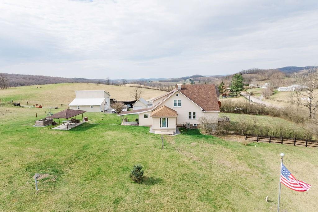 1898 Schellsburg Road Claysburg, PA 16625 - Photo 10 of 50 Side view of home with lawn and outdoor spaces