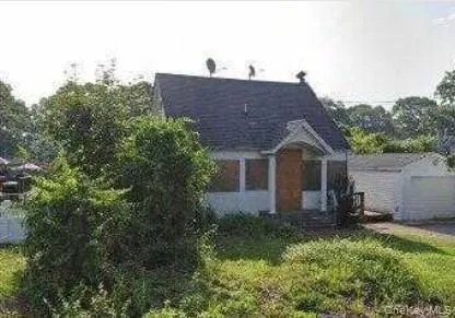 $360,000 | 77 Poospatuck Lane, Mastic, NY 11950