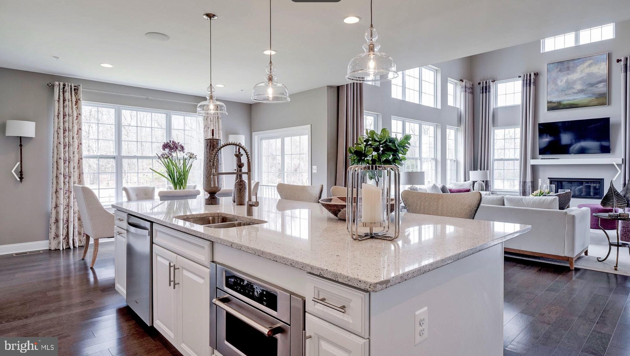 2686 B Jennings Chapel Road Woodbine, MD 21797 - Photo 12 of 63 a kitchen with granite countertop a sink a counter space appliances and cabinets