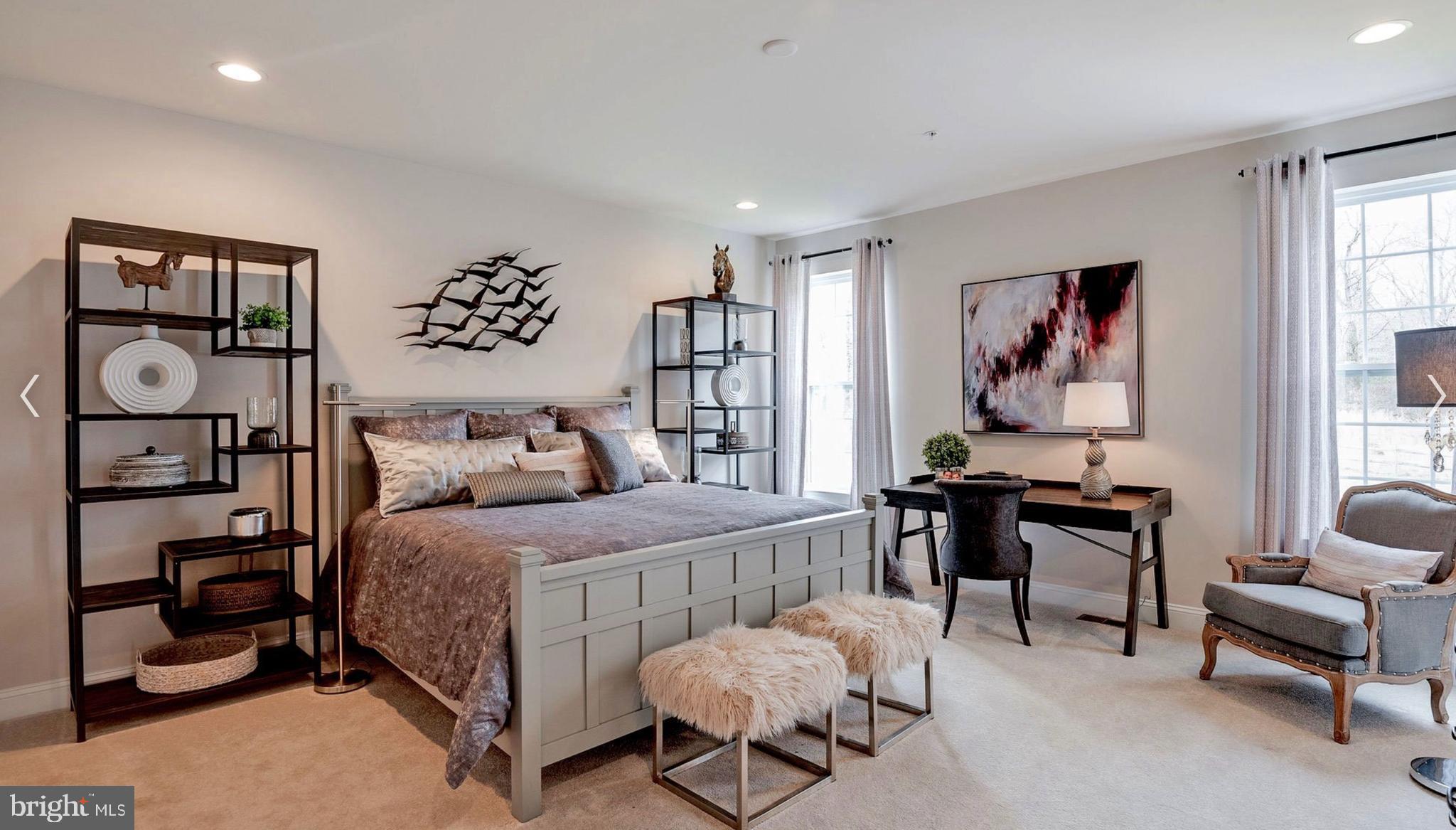 2686 B Jennings Chapel Road Woodbine, MD 21797 - Photo 24 of 63 a bedroom with a bed and a table in it