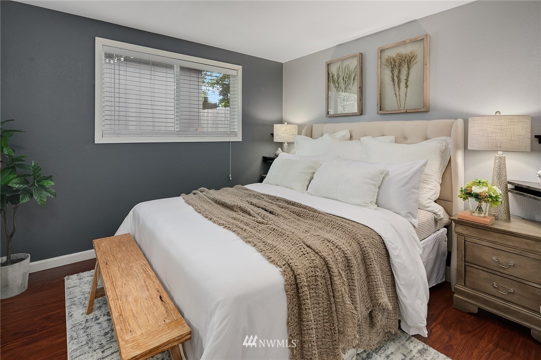 2613 Northeast 7th Street Renton, WA 98056 - Photo 11 of 23 a bedroom with bed and window