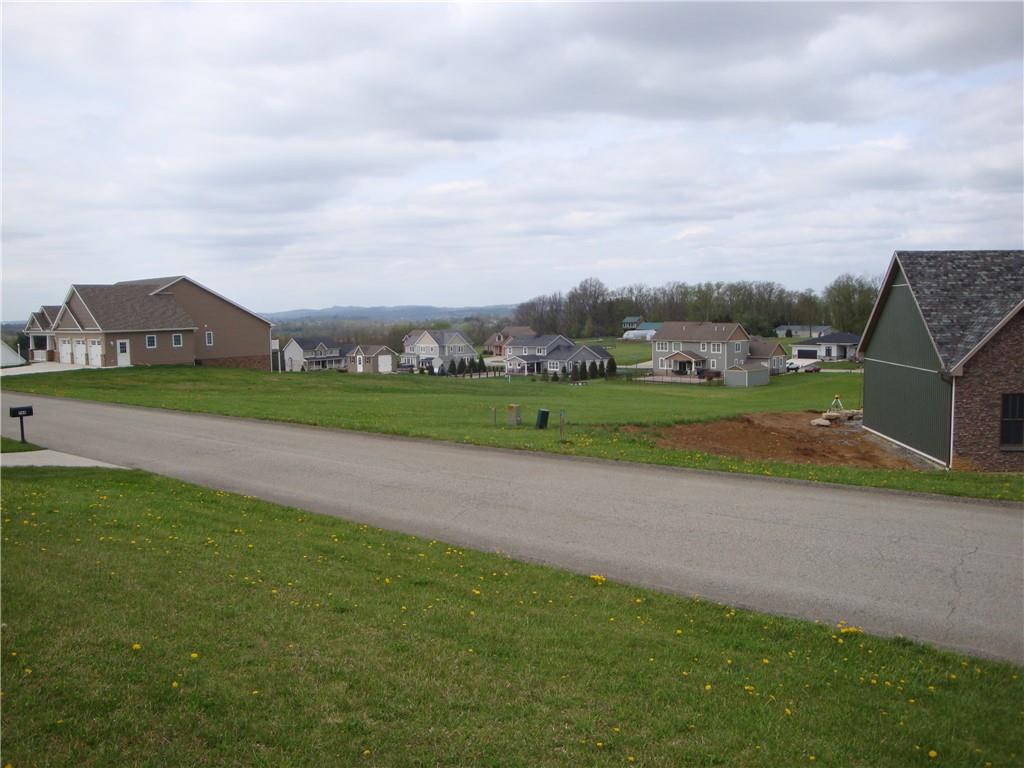 765 Victoria Way Derry, PA 15627 - Photo 4 of 5 a view of a big yard with potted plants and large tree