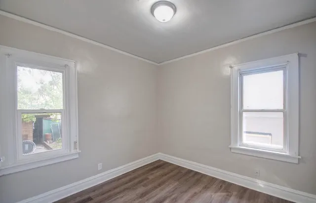 a view of livingroom with hardwood floor and window