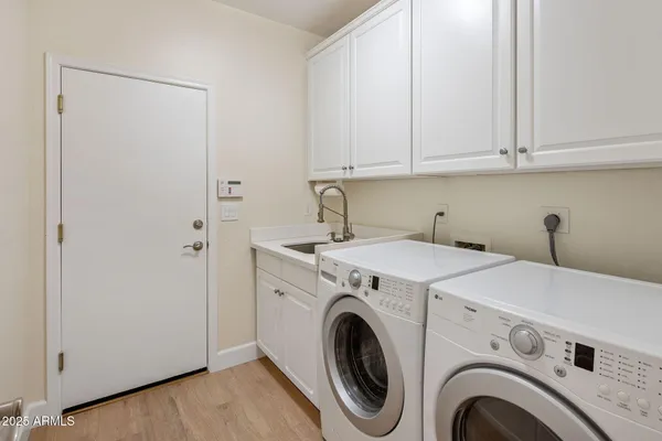 a view of an house with porch and furniture