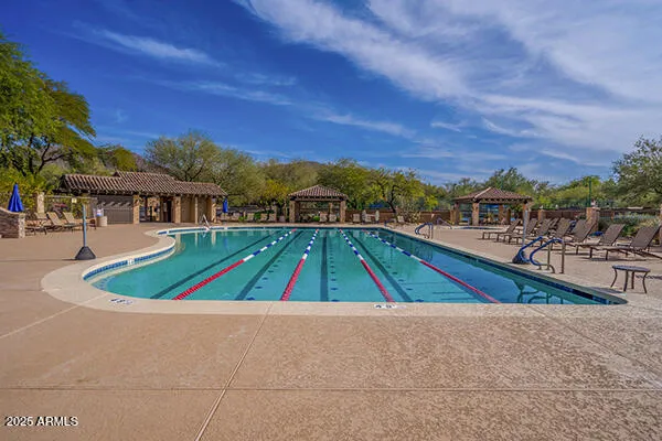 a view of a backyard with a ocean view