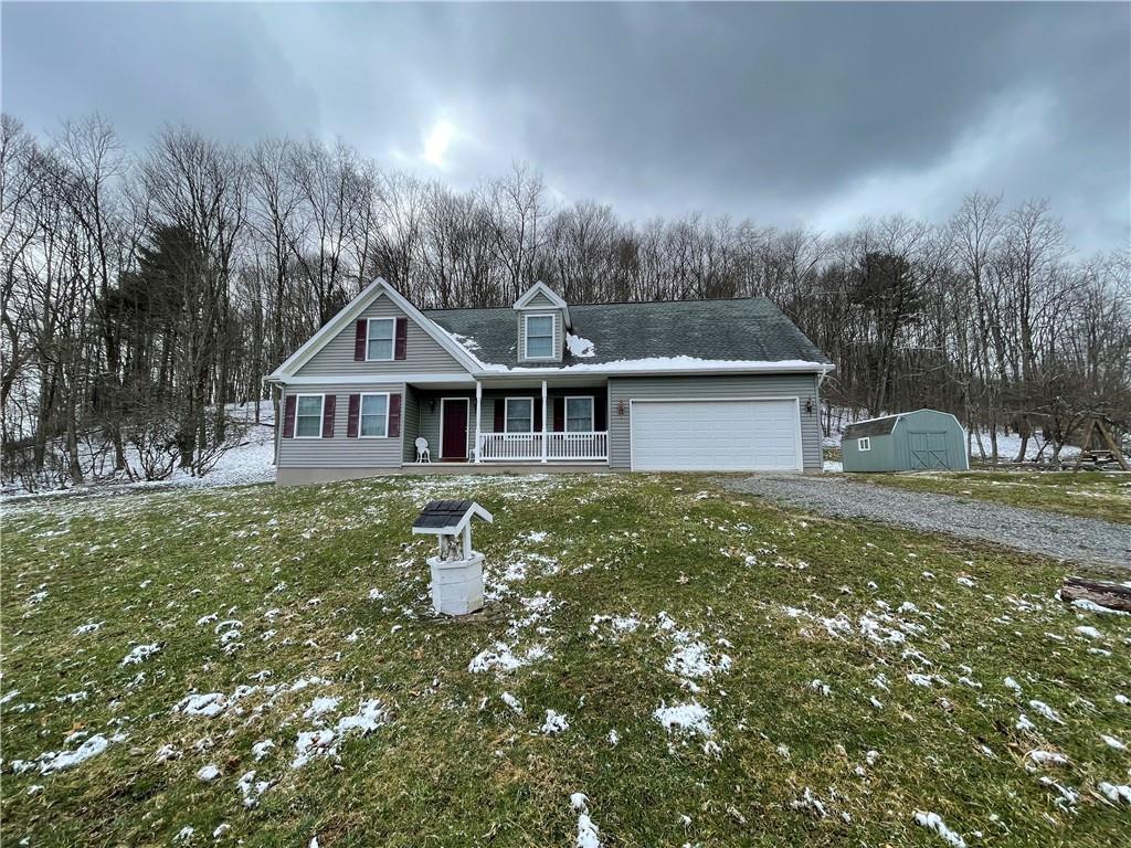 1723 Pine Vale Road Marion Center, PA 15759 - Photo 2 of 25 a front view of a house with garden