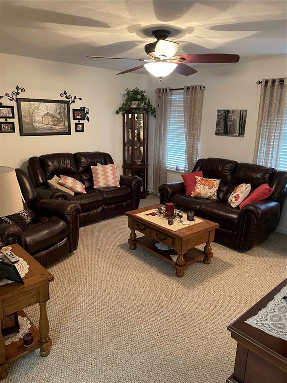 1723 Pine Vale Road Marion Center, PA 15759 - Photo 8 of 25 a living room with furniture and a chandelier