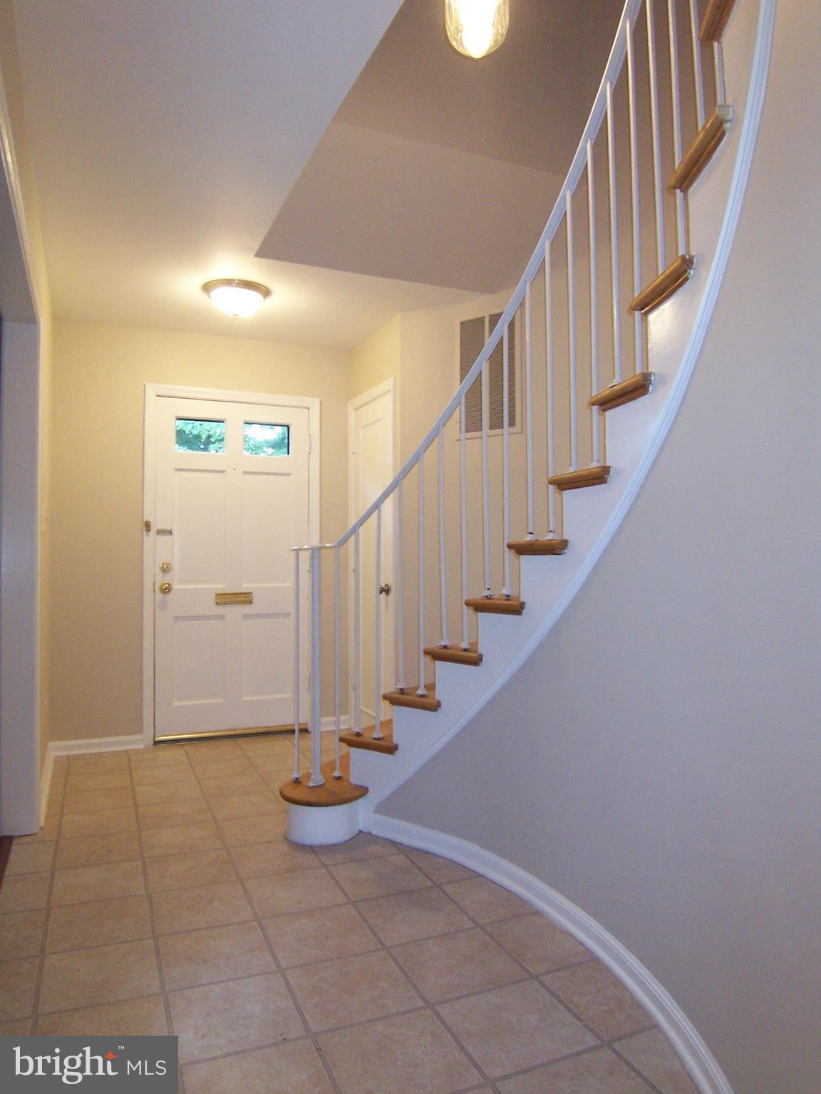 8355 Forrester Boulevard Springfield, VA 22152 - Photo 4 of 4 Curved stair Foyer
