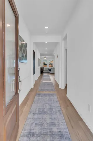 a view of a hallway with a furniture