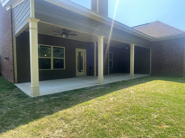 a bathroom with a shower and a sink