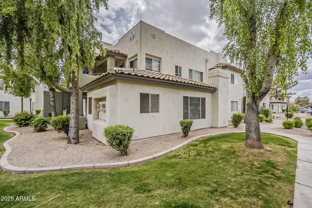 an aerial view of a house having yard