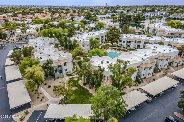 an aerial view of a building with outdoor space