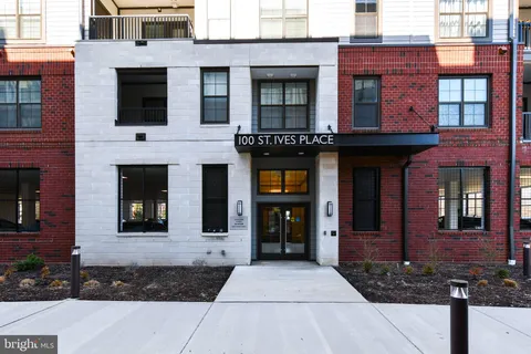 a view of a brick building with many windows