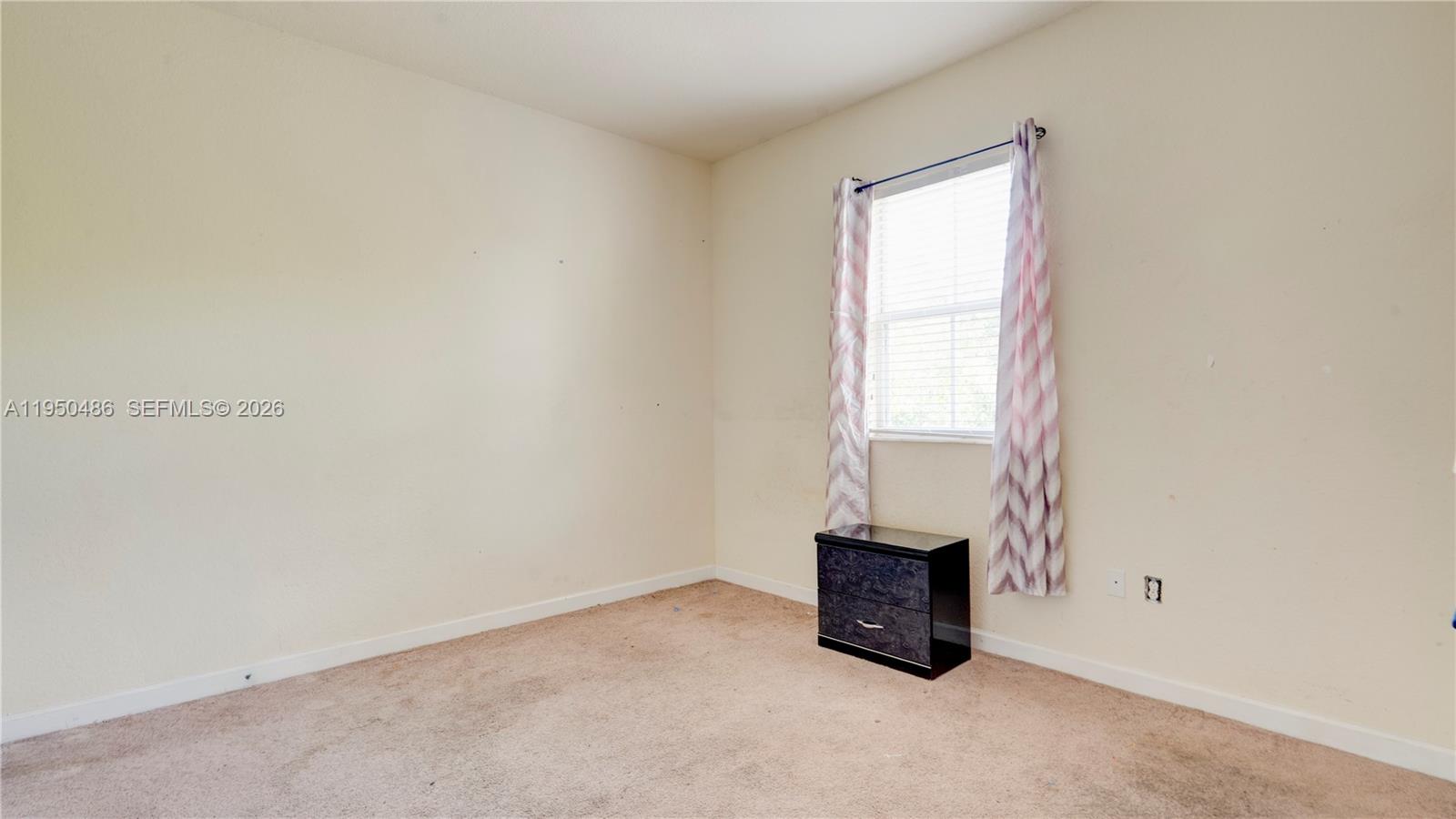 355 Northeast 31st Avenue Homestead, FL 33033 - Photo 25 of 62 an empty room with a window