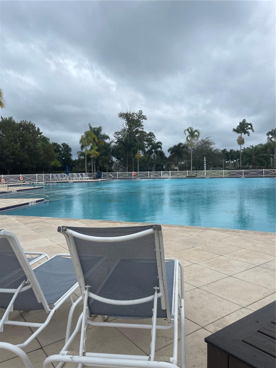 355 Northeast 31st Avenue Homestead, FL 33033 - Photo 51 of 62 a view of a lake with couches chairs