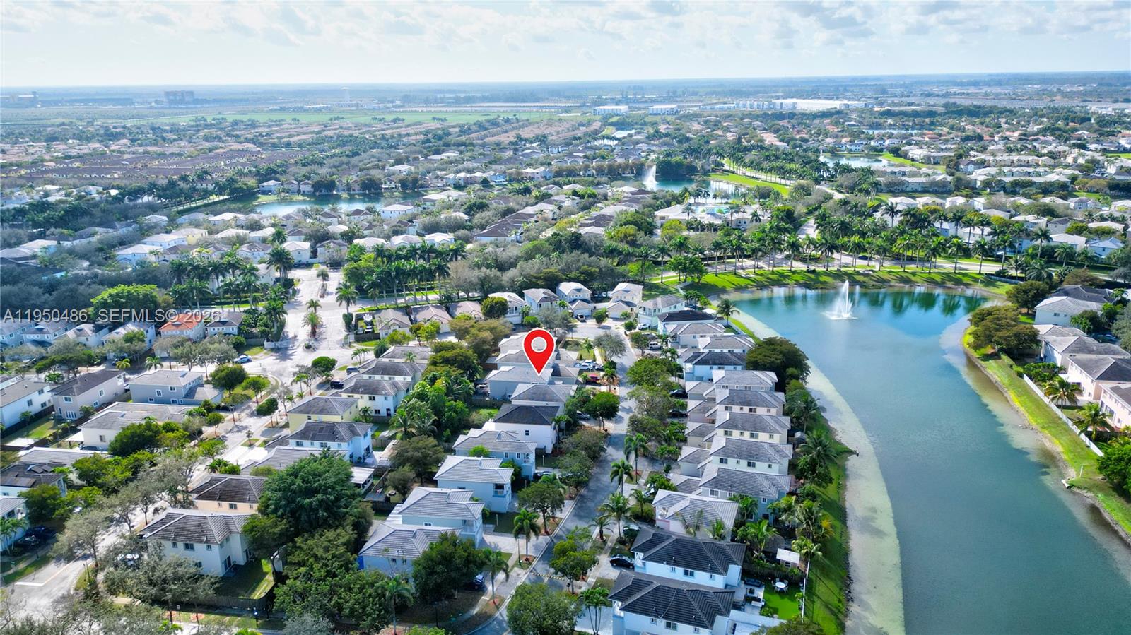 355 Northeast 31st Avenue Homestead, FL 33033 - Photo 57 of 62 an aerial view of lake and residential houses with outdoor space