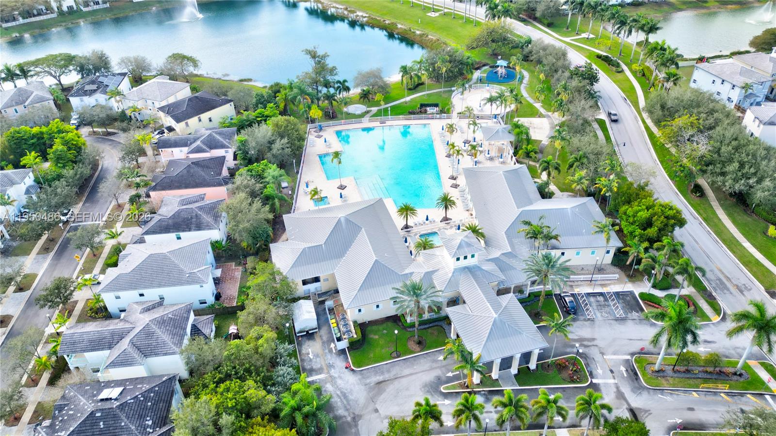 355 Northeast 31st Avenue Homestead, FL 33033 - Photo 59 of 62 an aerial view of residential houses with outdoor space and lake view