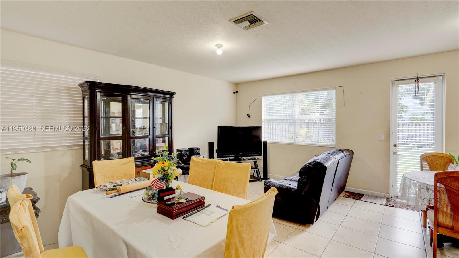 355 Northeast 31st Avenue Homestead, FL 33033 - Photo 10 of 62 a work room with furniture and a window