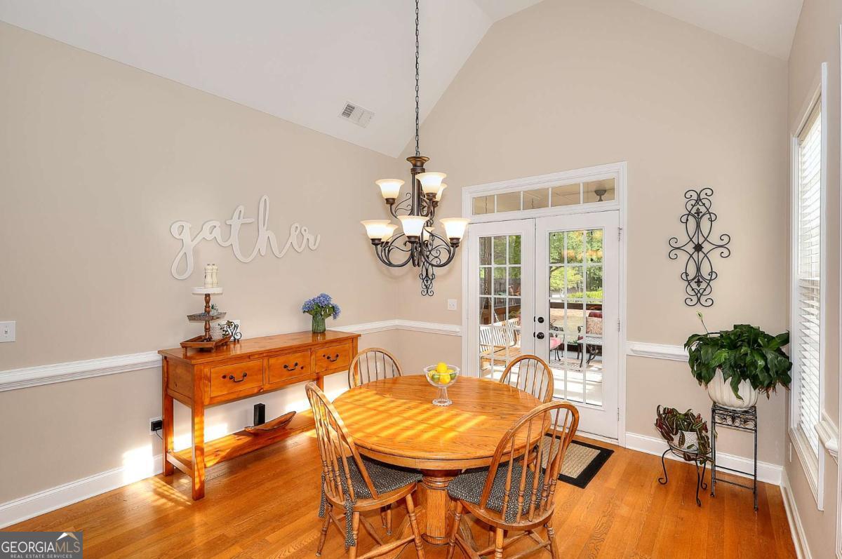 2385 Amberbrook Lane Grayson, GA 30017 - Photo 12 of 57 a dining room with furniture and window