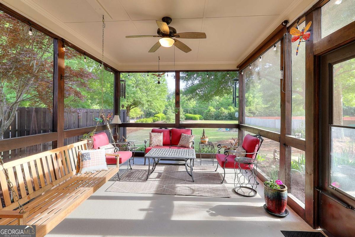 2385 Amberbrook Lane Grayson, GA 30017 - Photo 19 of 57 a sitting area with furniture on the deck