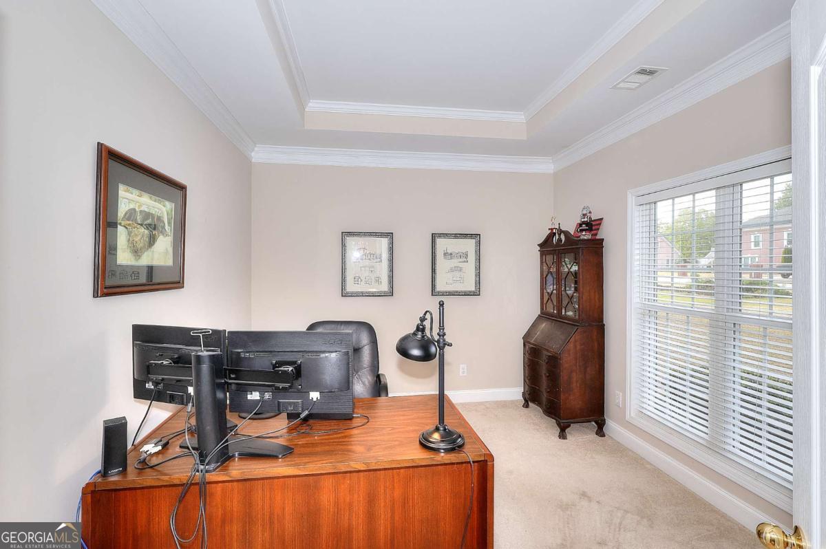 2385 Amberbrook Lane Grayson, GA 30017 - Photo 41 of 57 a room with furniture and window