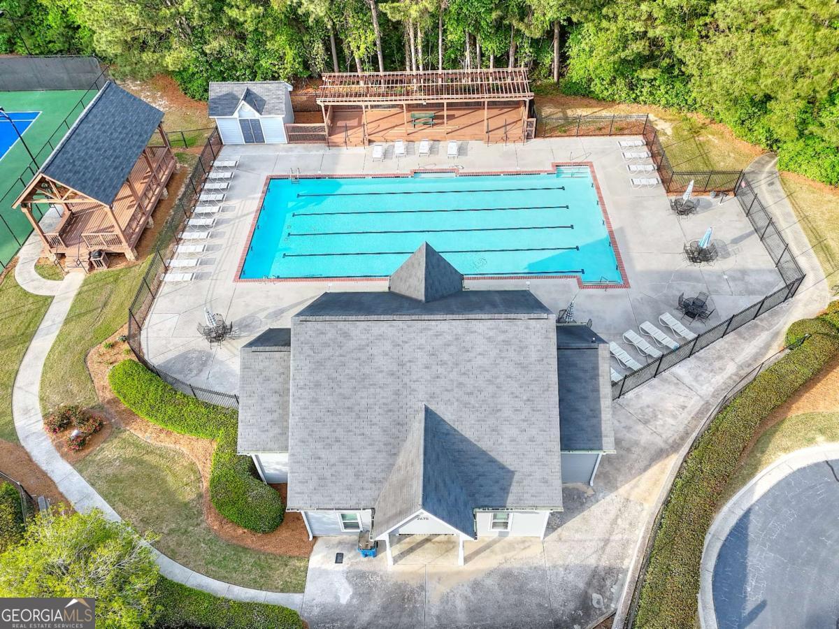 2385 Amberbrook Lane Grayson, GA 30017 - Photo 56 of 57 swimming pool view with a outdoor seating