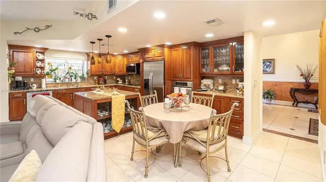 a bedroom with a bed and a potted plant