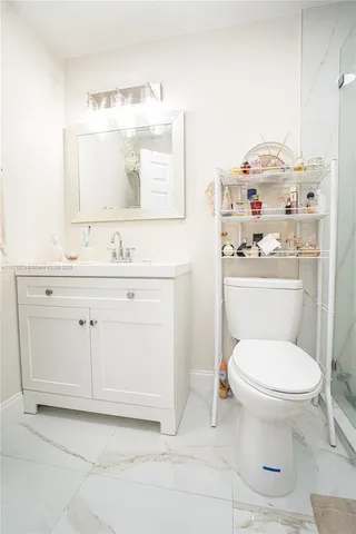 a bathroom with a shower and a tub