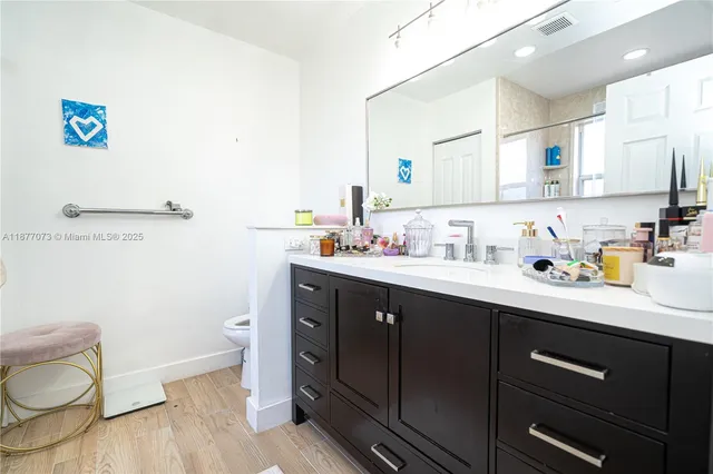 a view of a patio with a table and chairs in patio