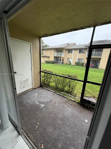 a view of a house with a street