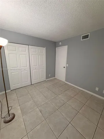 a view of a livingroom and entryway