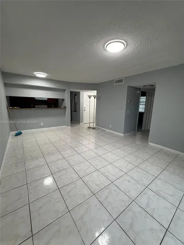 a view of a room & utility room