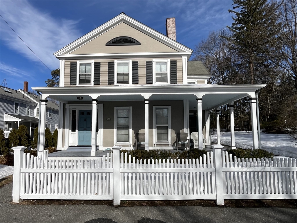 106 Main Street, Unit 2 Andover, MA 01810 - Photo 1 of 11 a front view of a house with a porch