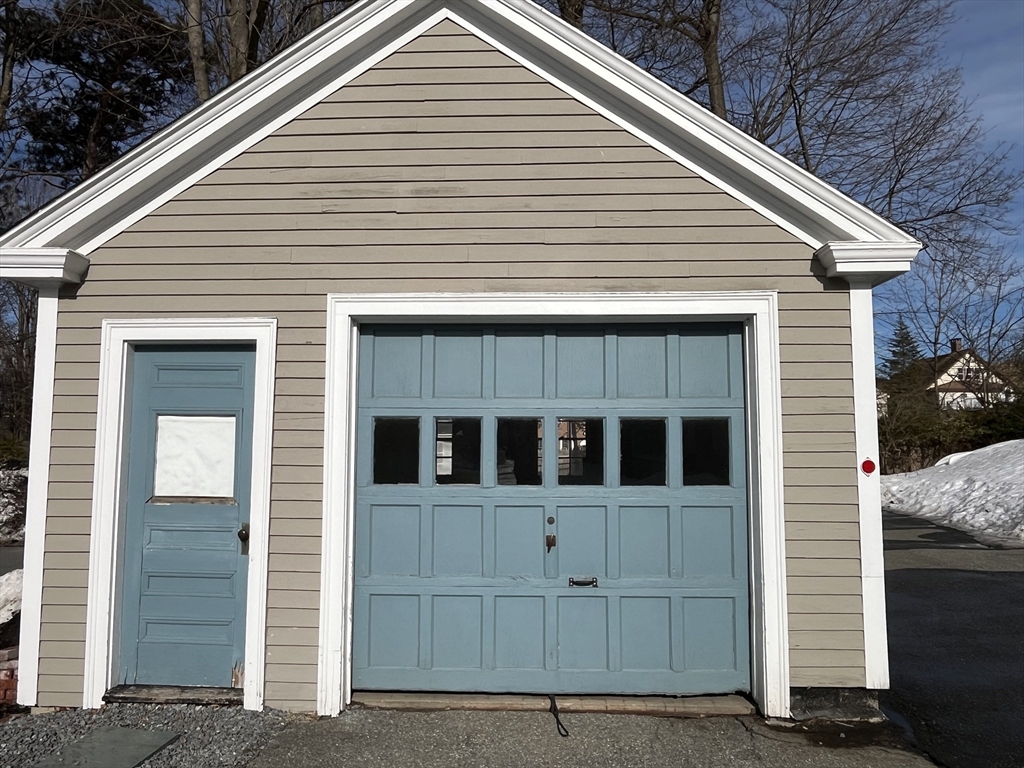 106 Main Street, Unit 2 Andover, MA 01810 - Photo 9 of 11 a view of a house with a yard